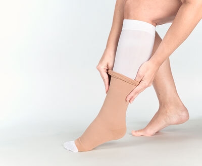 Actico UlcerSys behandl.strømp, XL beige/hvid lang