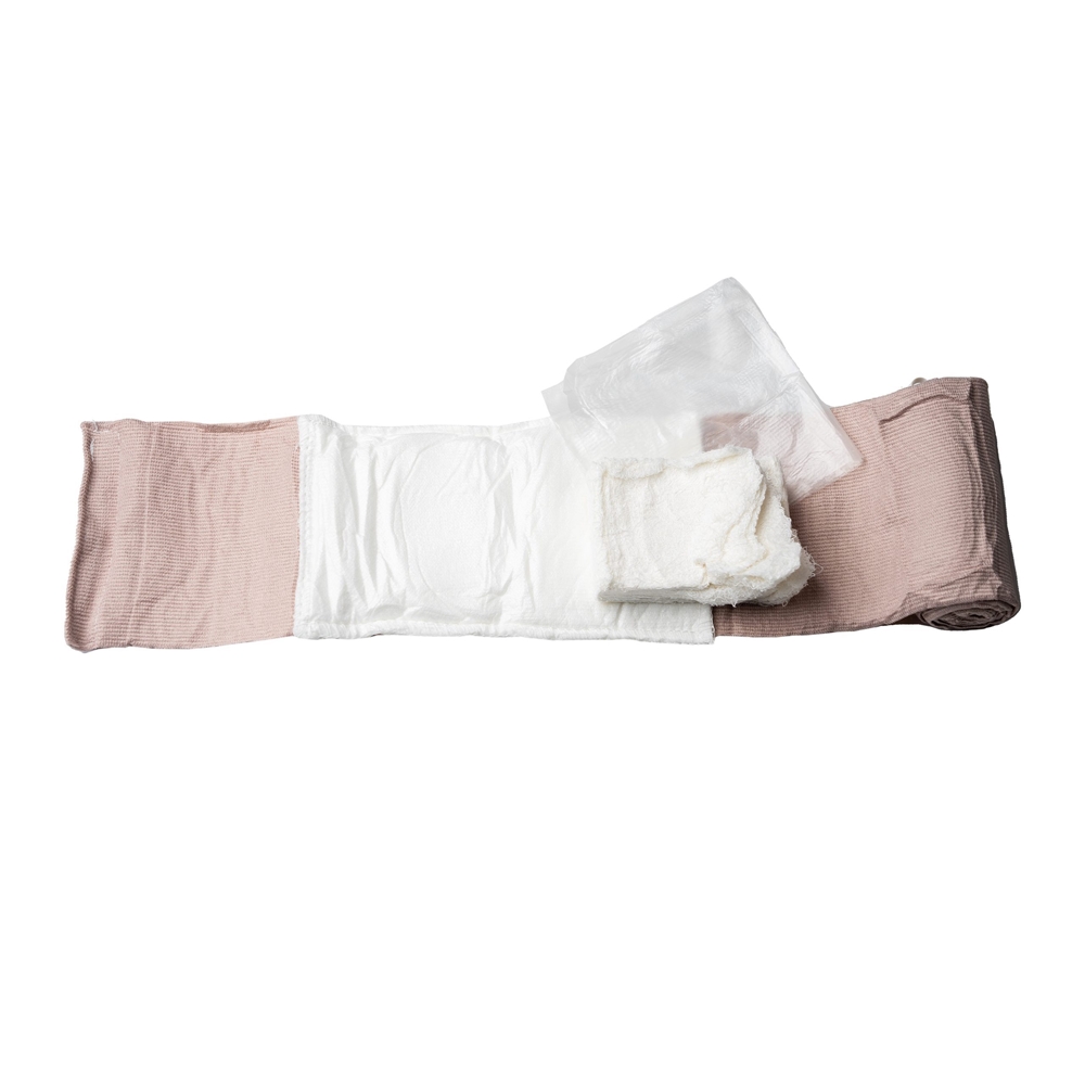 Sharkmed Alpha 4” bandage (Alpha bandage koostuu tarttumattomasta haavatyynystä, erittäin elastisesta siteestä, haavatyynyn alla olevasta 3,75 m pituisesta Z-gauzesta, sekä muovikalvosta ja kiinnitysmekanismista.)